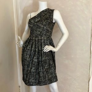 - Halston Heritage ivory and black one shoulder dress